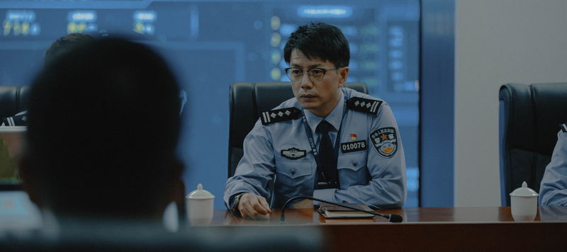 トニー・レオンの落ち着いた表情　経済犯罪捜査班との激しい駆け引き　「フォックス・ハント」場面写真